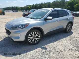 2021 Ford Escape Titanium Hybrid with VIN 1FMCU0DZXMUA78550, listed as a Copart auction lot 53389595 with 104,371 mi miles and Salvage title. Bid and sale history available at DreamBid. Image 1.