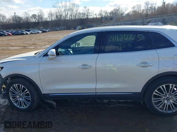 2016 Lincoln MKX Reserve with VIN 2LMTJ8LR4GBL44989, listed as a IAAI auction lot 41684823 with 101,528 mi miles. Bid and sale history available at carsss.com. Image 14.