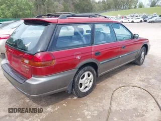 1996 Subaru Legacy Outback with VIN 4S3BG6857T7972309, listed as a IAAI auction lot 41971880 with 94,650 mi miles and . Bid and sale history available at DreamBid. Image 4.