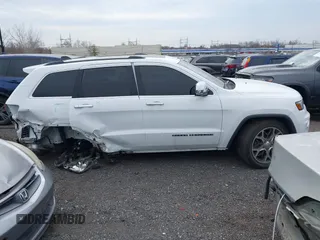 2019 Jeep Grand Cherokee Limited X with VIN 1C4RJFBG3KC831446, listed as a IAAI auction lot 41874908 with 21,407 mi miles and . Bid and sale history available at DreamBid. Image 13.