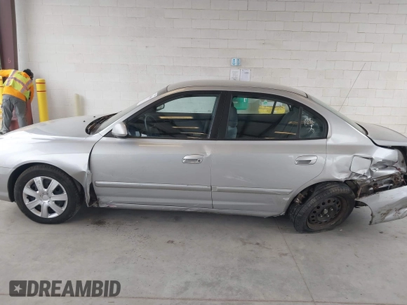 2002 Hyundai Elantra GLS z VIN KMHDN45D52U340239, wystawiony jako IAAI lot #42260604 z przebiegiem 288 297 mil mil oraz . Historia ofert i sprzedaży dostępna na DreamBid. Obrazek 15.