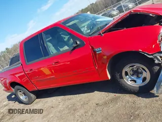 2003 Ford F-150 XLT with VIN 1FTRW07L03KC47484, listed as a IAAI auction lot 41653389 with 283,296 mi miles. Bid and sale history available at carsss.com. Image 13.