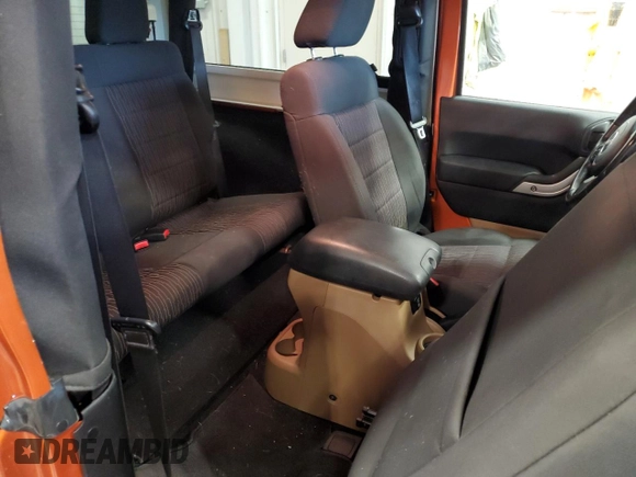 2011 Jeep Wrangler Sahara with VIN 1J4GA5D1XBL557392, listed as a Copart auction lot 56892835 with 109,567 mi miles and Clean title. Bid and sale history available at DreamBid. Image 11.