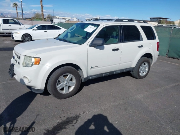 2009 Ford Escape Hybrid with VIN 1FMCU49349KA19086, listed as a IAAI auction lot 41704934 with 91,047 mi miles. Bid and sale history available at carsss.com. Image 2.