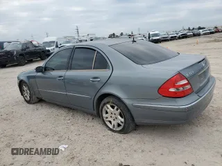 2005 Mercedes-Benz E-Class 3.2L with VIN WDBUF65J25A655040, listed as a Copart auction lot 87414674 with 147,847 mi miles and Salvage Title. Bid and sale history available at carsss.com. Image 2.