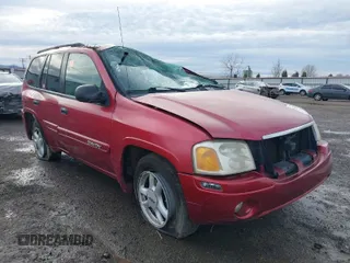 2005 GMC Envoy SLE with VIN 1GKDT13S552228037, listed as a IAAI auction lot 41131889 with 1 mi miles. Bid and sale history available at carsss.com. Image 1.