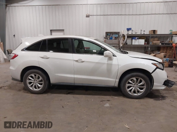 2016 Acura RDX Tech Pkg with VIN 5J8TB4H56GL018592, listed as a IAAI auction lot 41091796 with 101,569 mi miles. Bid and sale history available at carsss.com. Image 13.