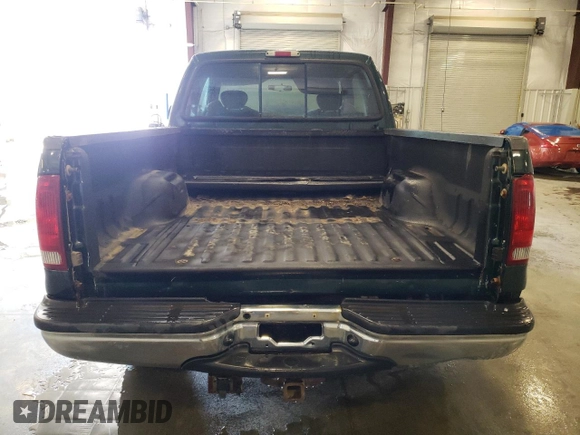 2001 Ford Super Duty F-250 XL with VIN 1FTNX21L91EC26077, listed as a Copart auction lot 71952324 with 221,340 mi miles and Salvage Title. Bid and sale history available at carsss.com. Image 6.