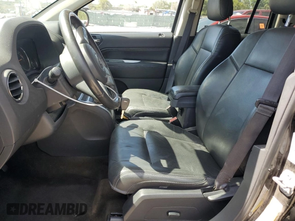2016 Jeep Compass High Altitude Edition with VIN 1C4NJDEB6GD697021, listed as a Copart auction lot 54332755 with 104,611 mi miles and Salvage Title. Bid and sale history available at carsss.com. Image 7.