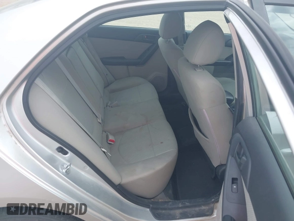 2012 Kia Forte EX with VIN KNAFU4A25C5591601, listed as a IAAI auction lot 42071351 with 120,636 mi miles. Bid and sale history available at carsss.com. Image 8.
