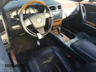 2009 Cadillac XLR Platinum z VIN 1G6YV36A395600052, wystawiony jako Copart lot #76961534 z przebiegiem 176 354 mil mil oraz Szkody całkowita. Historia ofert i sprzedaży dostępna na DreamBid. Obrazek 8.