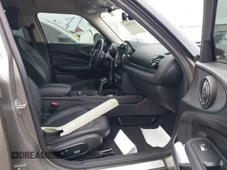 2016 MINI Clubman z VIN WMWLN5C56G2E30309, wystawiony jako IAAI lot #41772501 z przebiegiem 67 584 mil mil oraz . Historia ofert i sprzedaży dostępna na DreamBid. Obrazek 5.