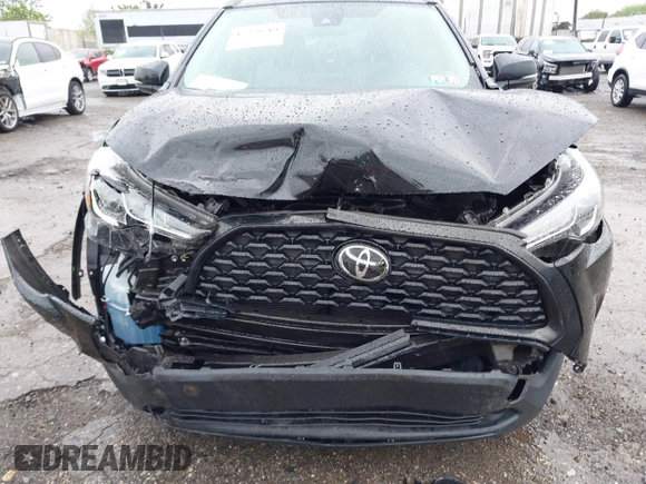2022 Toyota Corolla Cross LE with VIN 7MUCAABG8NV004527, listed as a IAAI auction lot 42259519 with 15,211 mi miles and . Bid and sale history available at DreamBid. Image 6.