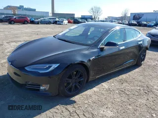 2020 Tesla Model S Long Range with VIN 5YJSA1E23LF381872, listed as a IAAI auction lot 41763046 with 96,720 mi miles and . Bid and sale history available at DreamBid. Image 25.