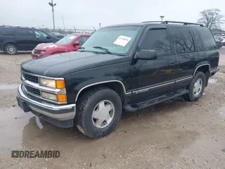 1999 Chevrolet Tahoe Z71 with VIN 1GNEK13R8XJ497892, listed as a IAAI auction lot 42120856 with 172,150 mi miles and . Bid and sale history available at DreamBid. Image 2.