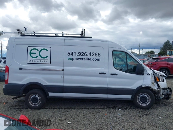 2022 Ford Transit Cargo with VIN 1FTBR1C83NKA78404, listed as a IAAI auction lot 40335158 with 31,273 mi miles and . Bid and sale history available at DreamBid. Image 13.