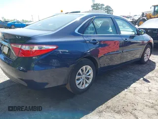 2016 Toyota Camry XLE with VIN 4T1BF1FKXGU606006, listed as a IAAI auction lot 42058339 with 94,058 mi miles. Bid and sale history available at carsss.com. Image 4.