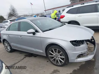 2015 Audi A3 Premium Plus z VIN WAUCCGFFXF1020409, wystawiony jako IAAI lot #41534468 z przebiegiem 116 708 mil mil oraz . Historia ofert i sprzedaży dostępna na DreamBid. Obrazek 14.