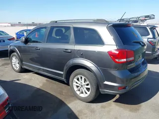 2017 Dodge Journey SXT with VIN 3C4PDCBBXHT506498, listed as a IAAI auction lot 42057667 with 110,059 mi miles and . Bid and sale history available at DreamBid. Image 3.