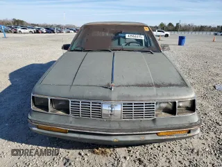1986 Oldsmobile Cutlass Ciera with VIN 1G3AM19R8GG312651, listed as a Copart auction lot 42964415 with 67,874 mi miles and Clean Title. Bid and sale history available at DreamBid. Image 5.