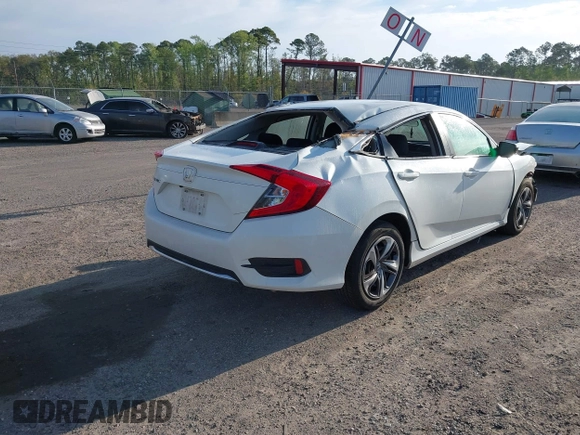 2020 Honda Civic LX with VIN 19XFC2F62LE212421, listed as a IAAI auction lot 41909995 with 46,312 mi miles and . Bid and sale history available at DreamBid. Image 4.
