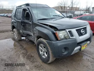 2011 Nissan Xterra Pro-4X with VIN 5N1AN0NWXBC500523, listed as a IAAI auction lot 42016031 with 122,795 mi miles and . Bid and sale history available at DreamBid. Image 1.