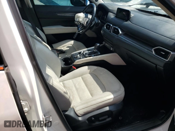 2019 Mazda CX-5 Grand Touring with VIN JM3KFADM6K1581261, listed as a Copart auction lot 59965175 with 127,837 mi miles and Salvage title. Bid and sale history available at DreamBid. Image 7.