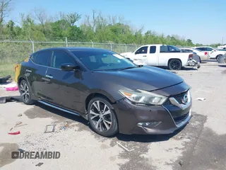 2016 Nissan Maxima SV z VIN 1N4AA6AP8GC411225, wystawiony jako IAAI lot #41984961 z przebiegiem 150 611 mil mil oraz . Historia ofert i sprzedaży dostępna na DreamBid. Obrazek 1.