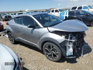 2018 Toyota C-HR XLE with VIN JTNKHMBX4J1003588, listed as a Copart auction lot 56021405 with 34,416 mi miles and Salvage title. Bid and sale history available at DreamBid. Image 4.