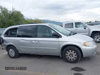 2007 Chrysler Town & Country with VIN 2A4GP44R27R191148, listed as a IAAI auction lot 42171218 with 150,670 mi miles and . Bid and sale history available at DreamBid. Image 14.