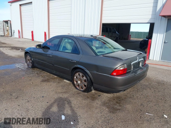 2004 Lincoln LS with VIN 1LNHM87A04Y671711, listed as a IAAI auction lot 41606121 with 1 mi miles. Bid and sale history available at carsss.com. Image 3.