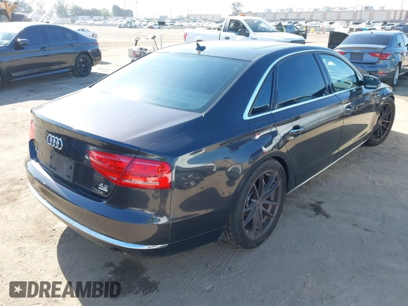 2011 Audi A8 with VIN WAURVAFD9BN014362, listed as a IAAI auction lot 41960366 with 135,244 mi miles and . Bid and sale history available at DreamBid. Image 4.