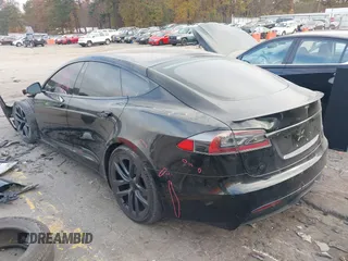 2022 Tesla Model S Plaid with VIN 5YJSA1E6XNF460235, listed as a IAAI auction lot 40951359 with 18,922 mi miles and . Bid and sale history available at DreamBid. Image 3.