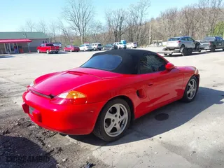 2000 Porsche Boxster with VIN WP0CA2982YU622019, listed as a IAAI auction lot 41983172 with 117,575 mi miles. Bid and sale history available at carsss.com. Image 4.