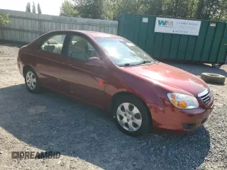 2007 Kia Spectra EX with VIN KNAFE121975376780, listed as a Copart auction lot 60738525 with 78,148 mi miles and Salvage title. Bid and sale history available at DreamBid. Image 4.