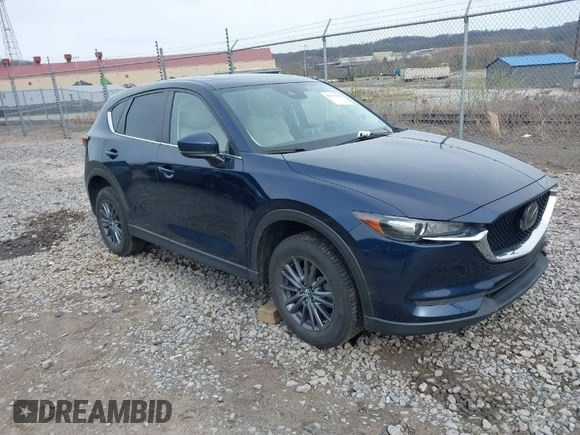 2019 Mazda CX-5 Touring with VIN JM3KFBCM5K0689948, listed as a IAAI auction lot 41976266 with 74,812 mi miles. Bid and sale history available at carsss.com. Image 1.