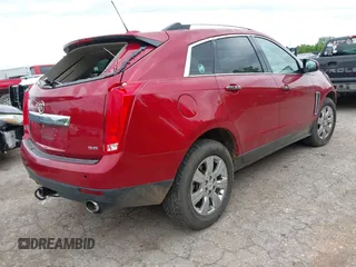 2016 Cadillac SRX Premium Collection z VIN 3GYFNDE37GS525186, wystawiony jako IAAI lot #42179497 z przebiegiem 117 200 mil mil oraz . Historia ofert i sprzedaży dostępna na DreamBid. Obrazek 4.