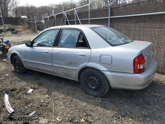 2000 Mazda Protege DX with VIN JM1BJ222XY0199683, listed as a Copart auction lot 50010565 with 139,428 mi miles and Salvage Title. Bid and sale history available at carsss.com. Image 2.
