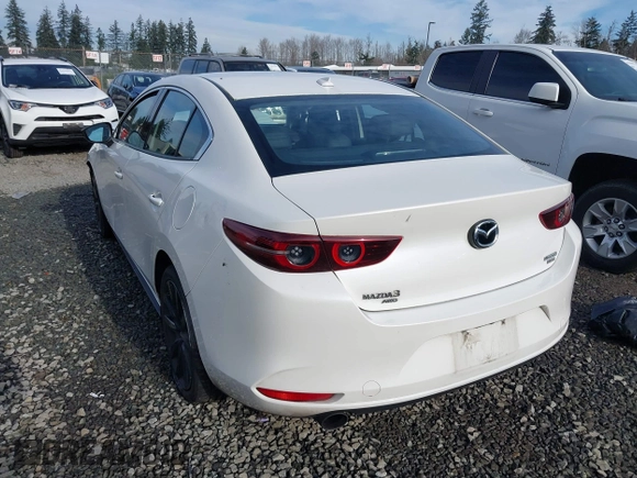 2021 Mazda 3 2.5 Turbo with VIN JM1BPBAY6M1318449, listed as a IAAI auction lot 41408726 with 75,163 mi miles and . Bid and sale history available at DreamBid. Image 3.