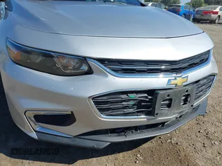 2016 Chevrolet Malibu LS z VIN 1G1ZB5ST9GF340558, wystawiony jako IAAI lot #42520463 z przebiegiem 104 296 mil mil oraz . Historia ofert i sprzedaży dostępna na DreamBid. Obrazek 21.