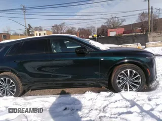 2024 Cadillac LYRIQ z VIN 1GYKPVRL8RZ128147, wystawiony jako IAAI lot #41273392 z przebiegiem 1 927 mil mil oraz . Historia ofert i sprzedaży dostępna na DreamBid. Obrazek 13.