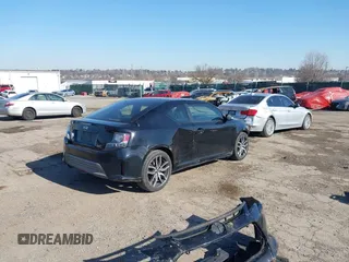 2014 Scion tC with VIN JTKJF5C78E3074094, listed as a IAAI auction lot 41828785 with 164,976 mi miles. Bid and sale history available at carsss.com. Image 4.