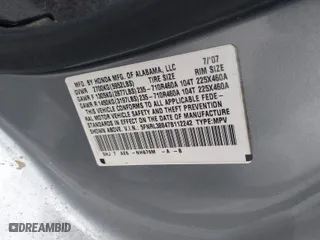 2007 Honda Odyssey Touring with VIN 5FNRL38847B112242, listed as a IAAI auction lot 41772442 with 211,753 mi miles. Bid and sale history available at carsss.com. Image 9.