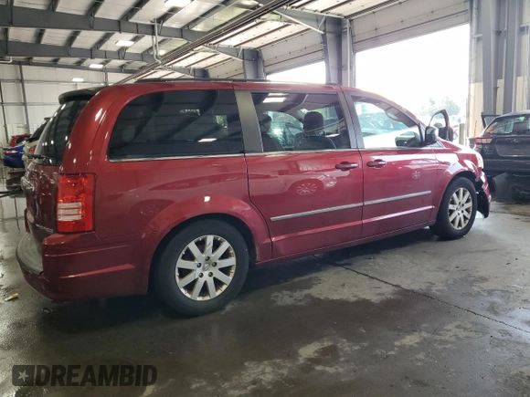 2010 Chrysler Town & Country Touring Plus with VIN 2A4RR8DX1AR427546, listed as a Copart auction lot 68314214 with 188,510 mi miles and Salvage Title. Bid and sale history available at DreamBid. Image 3.