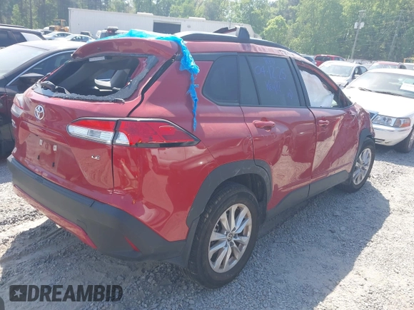 2024 Toyota Corolla Cross LE with VIN 7MUCAAAGXRV087580, listed as a IAAI auction lot 42067635 with 5,699 mi miles and . Bid and sale history available at DreamBid. Image 4.