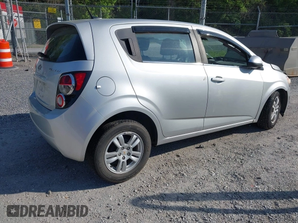 2012 Chevrolet Sonic LT with VIN 1G1JC6SH5C4167574, listed as a IAAI auction lot 42133100 with 59,473 mi miles and . Bid and sale history available at DreamBid. Image 4.