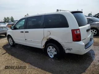 2009 Dodge Grand Caravan with VIN 1D8HN11E99B505784, listed as a Copart auction lot 60590065 with 195,488 mi miles and Salvage title. Bid and sale history available at DreamBid. Image 2.