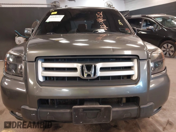 2007 Honda Pilot EX-L z VIN 2HKYF18687H533288, wystawiony jako IAAI lot #42046152 z przebiegiem 165 953 mil mil oraz . Historia ofert i sprzedaży dostępna na DreamBid. Obrazek 12.