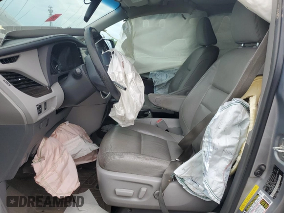 2015 Toyota Sienna XLE с VIN 5TDYK3DC1FS541180, выставлен на аукционе Copart как лот 59078585 с пробегом 94 014 миль миль и Списание • Salvage title. История ставок и продаж доступна на DreamBid. Изображение 7.