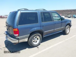 1999 Ford Explorer XLT z VIN 1FMDU34EXXZA79739, wystawiony jako IAAI lot #42353736 z przebiegiem 377 224 mil mil oraz . Historia ofert i sprzedaży dostępna na DreamBid. Obrazek 4.